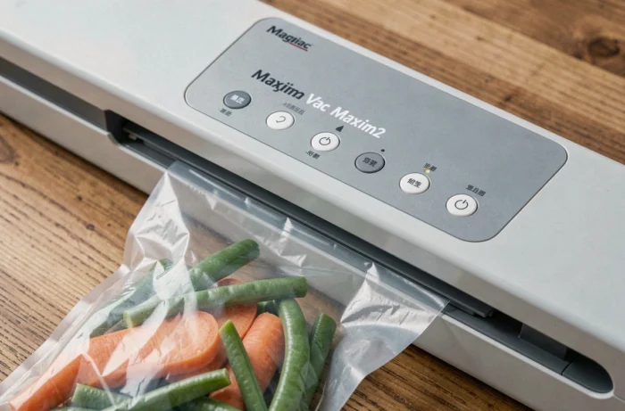 Gros plan sur le panneau de commande et la barre de soudure de la Magic Vac Maxima 2